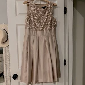 Woman’s dress size 14